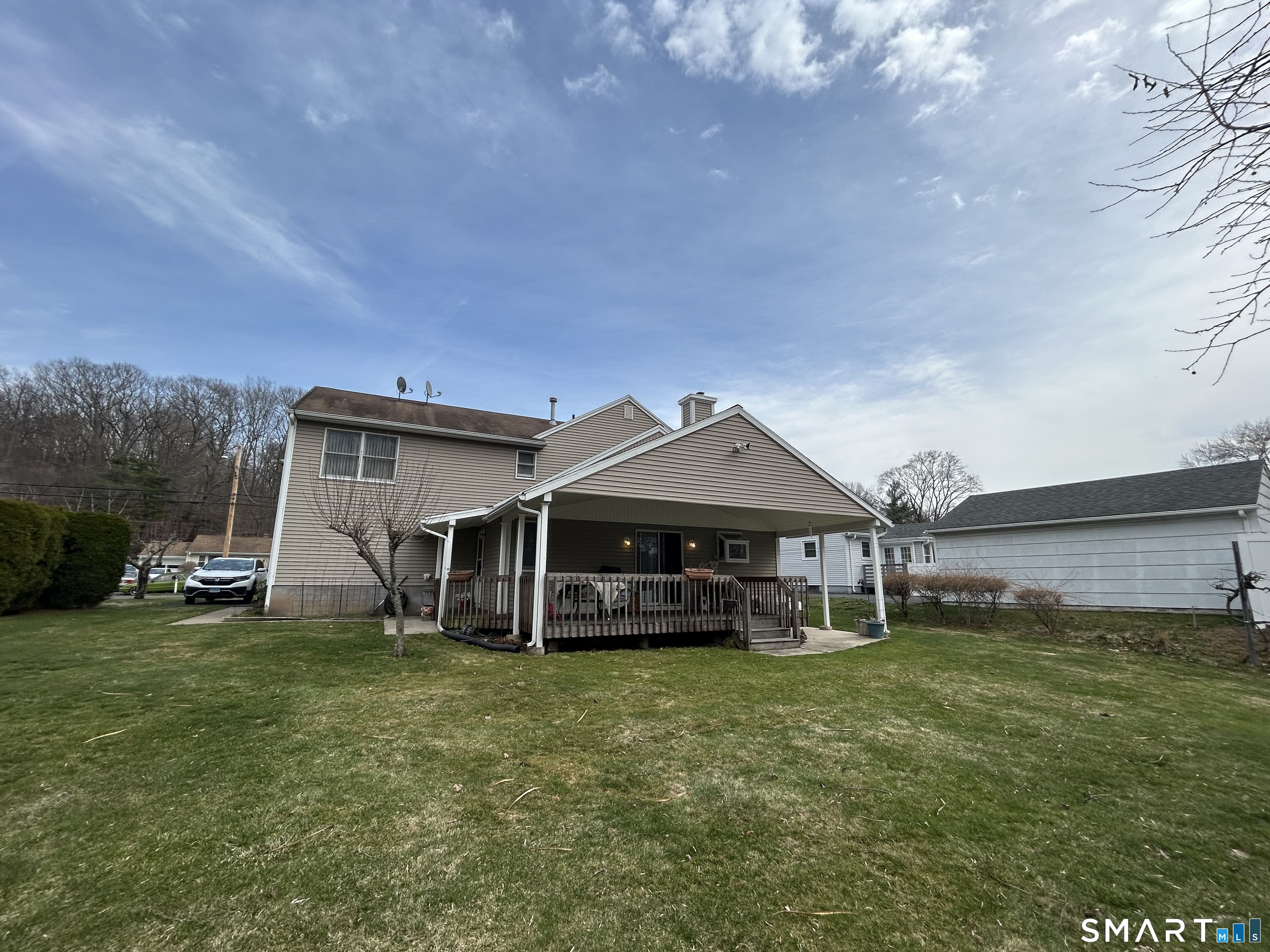 720 Circular Avenue Hamden, CT 06514 - Photo 28 of 35 a front view of a house with garden