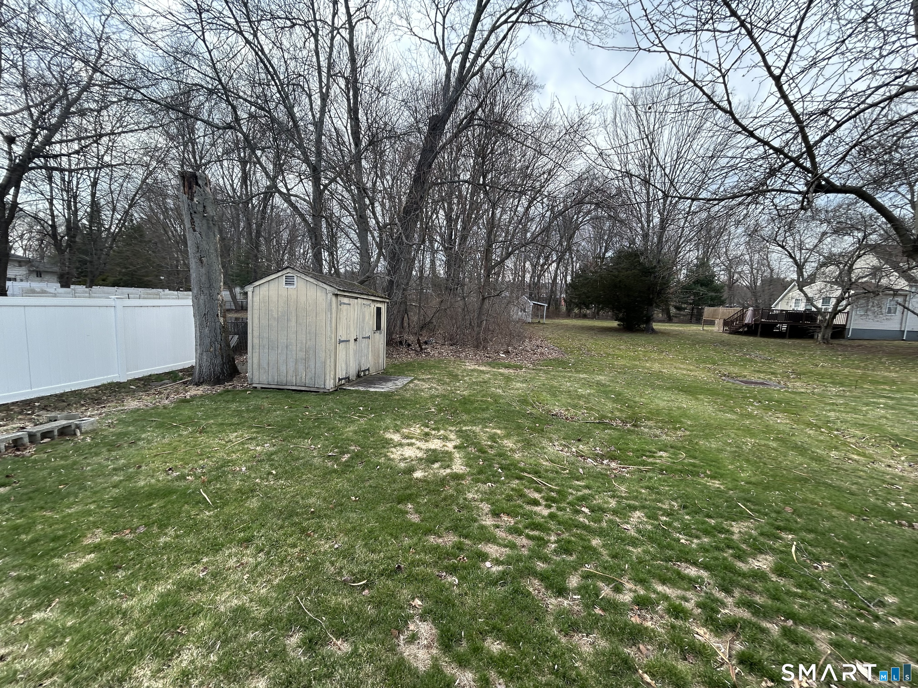 720 Circular Avenue Hamden, CT 06514 - Photo 29 of 35 a view of a backyard with large trees