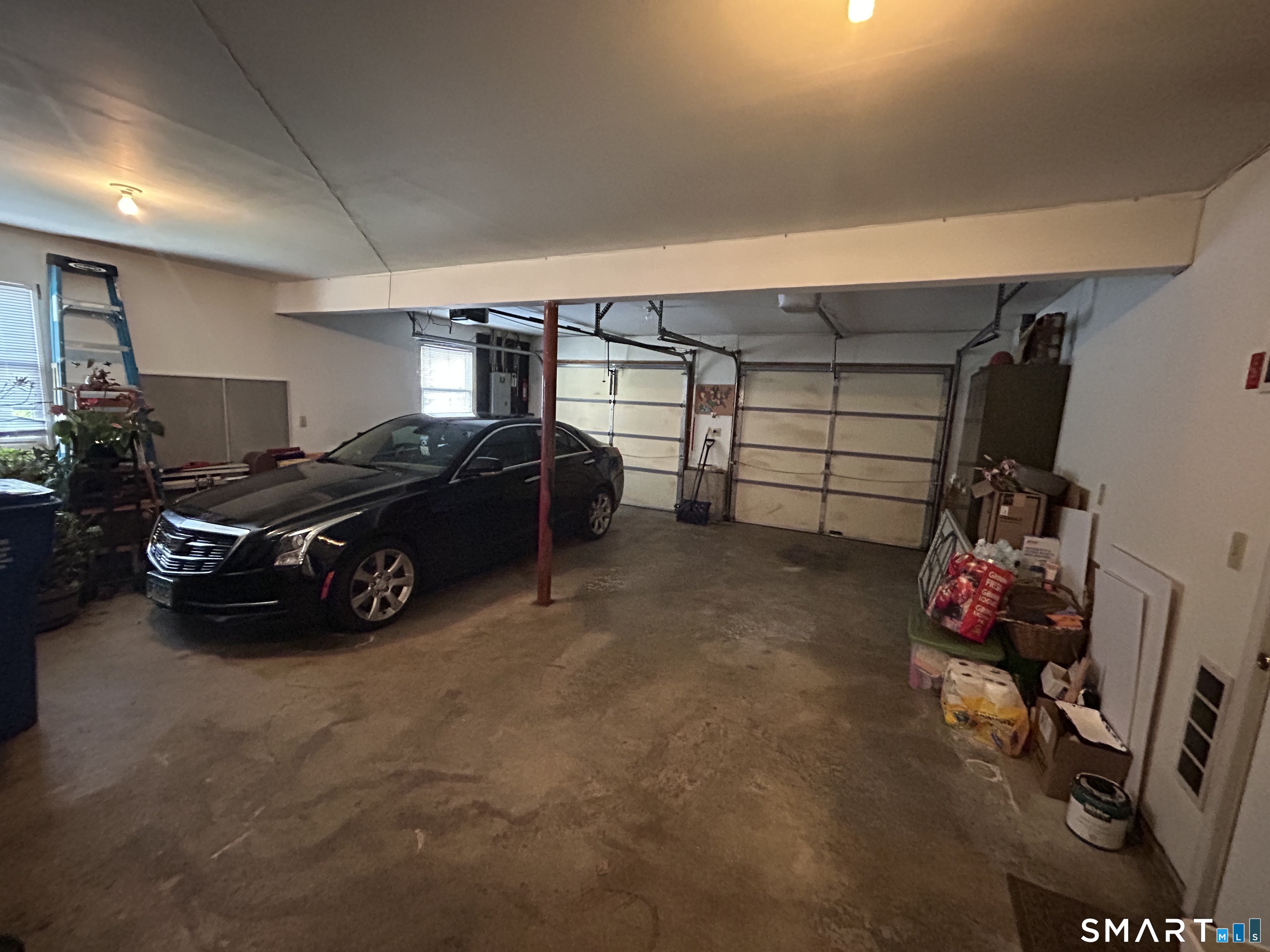 720 Circular Avenue Hamden, CT 06514 - Photo 33 of 35 a car parked in a garage