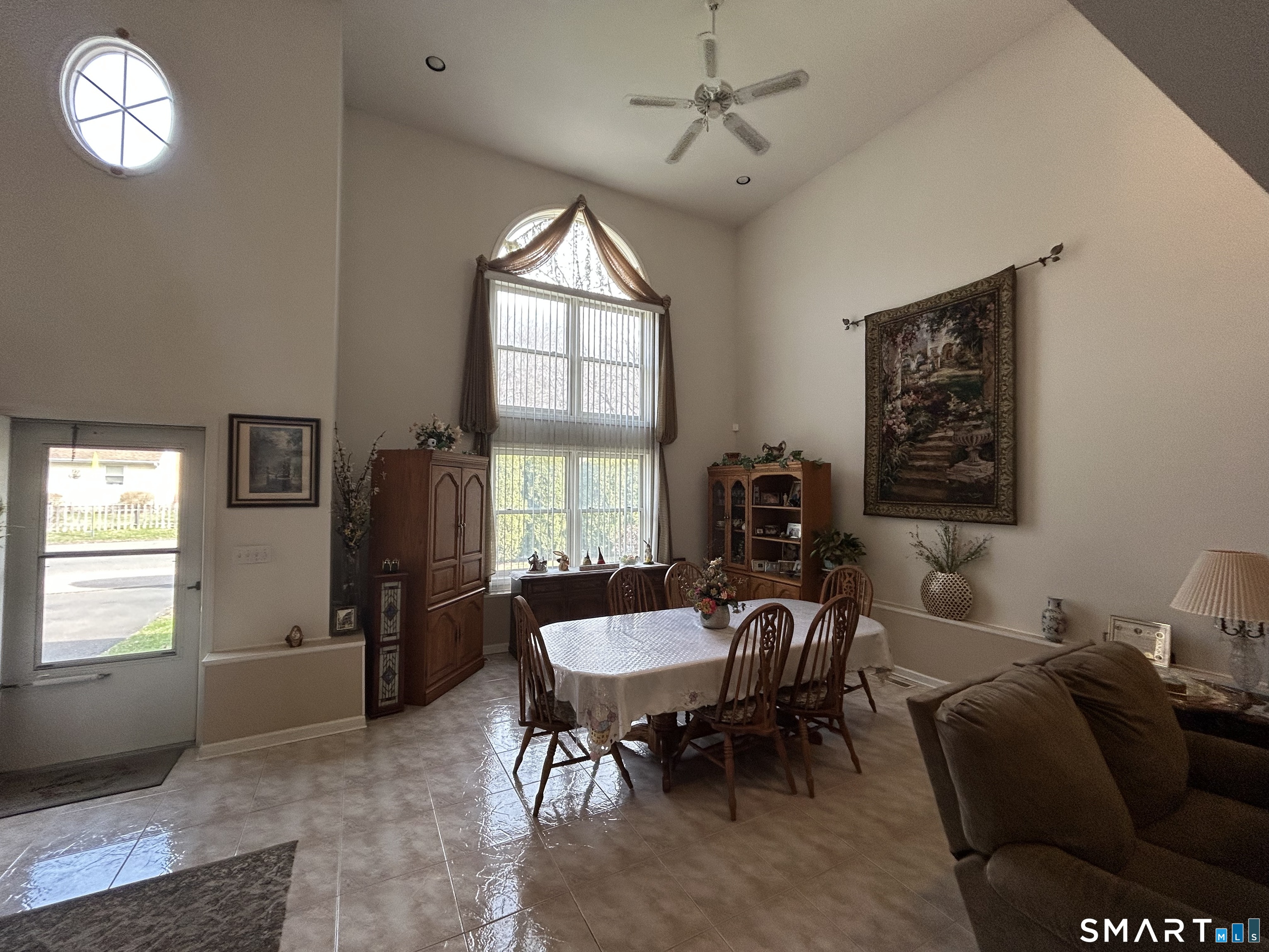 720 Circular Avenue Hamden, CT 06514 - Photo 6 of 35 a view of a livingroom with furniture and a window