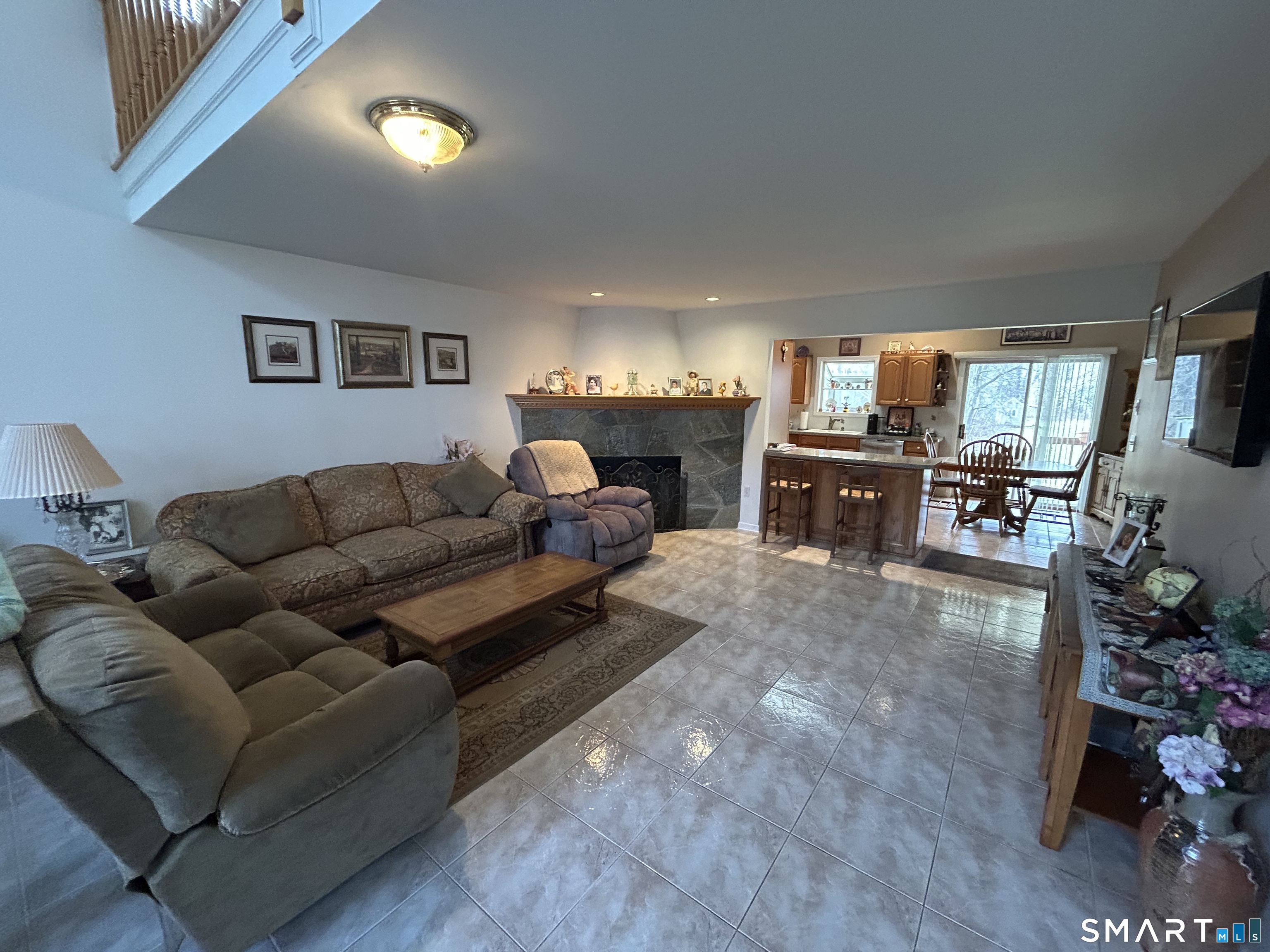 720 Circular Avenue Hamden, CT 06514 - Photo 7 of 35 a living room with furniture and a flat screen tv