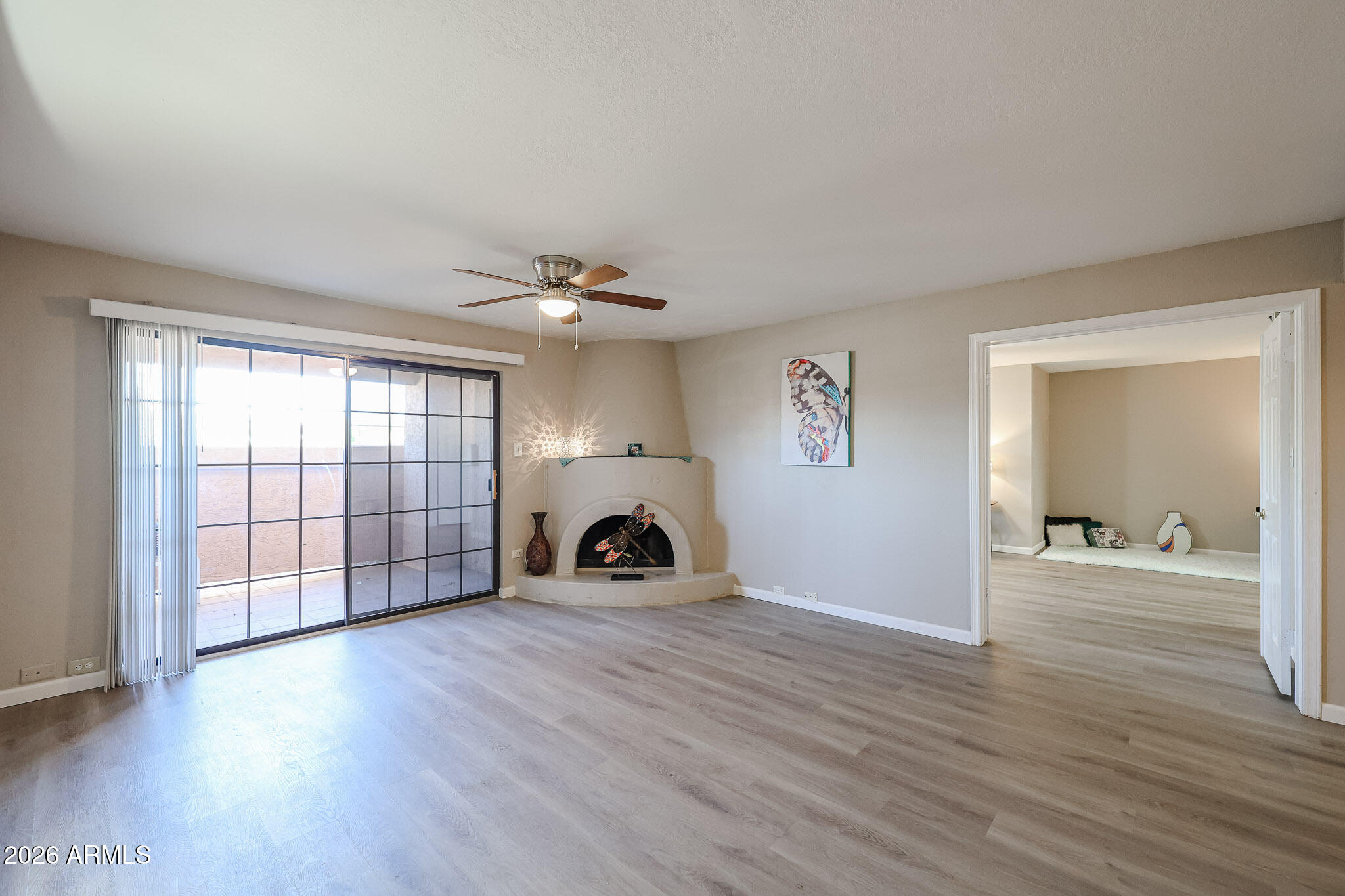 10410 North Cave Creek Road, Unit 1011 Phoenix, AZ 85020 - Photo 4 of 54 a view of a livingroom with wooden floor