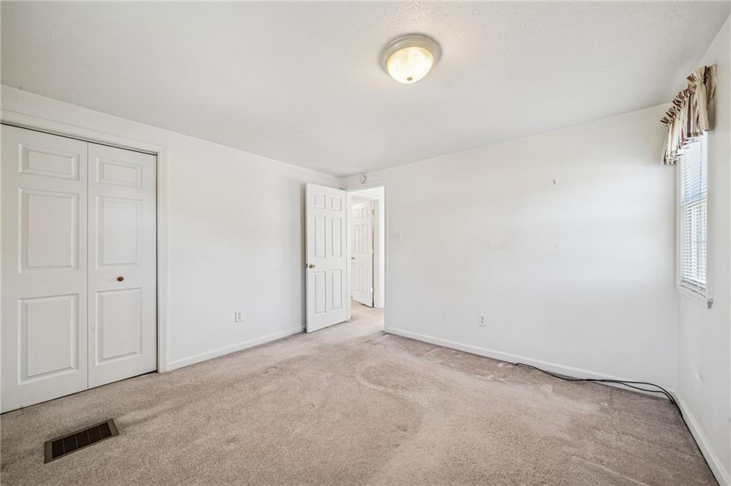 1813 Service Lane Monessen, PA 15062 - Photo 20 of 31 an empty room with windows