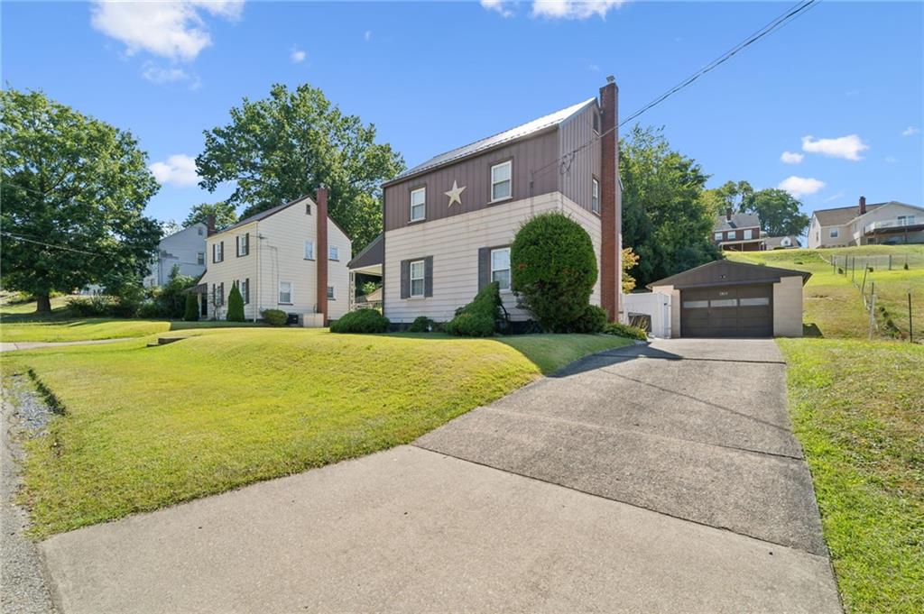 1813 Service Lane Monessen, PA 15062 - Photo 2 of 31 a house view with a garden space