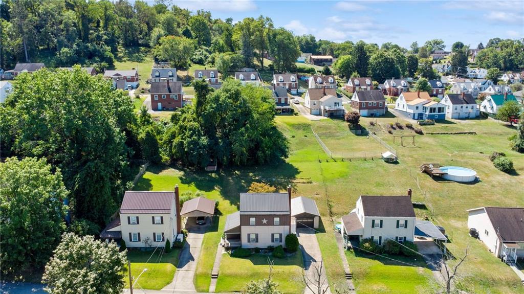 1813 Service Lane Monessen, PA 15062 - Photo 30 of 31 aerial view of multiple houses with yard