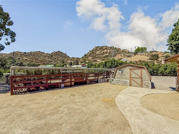 a chairs and table in a room with a window