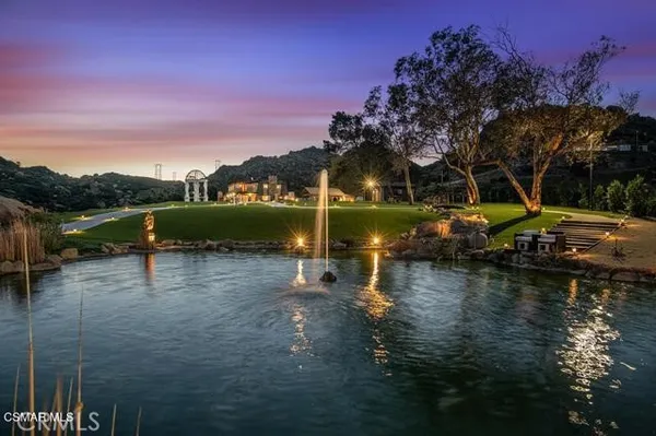 a sign board on the wall of a building