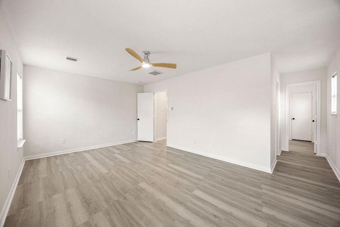 1010 Hummingbird Point Lane Houston, TX 77090 - Photo 13 of 26 Private primary suite tucked away at the back for added comfort and privacy.