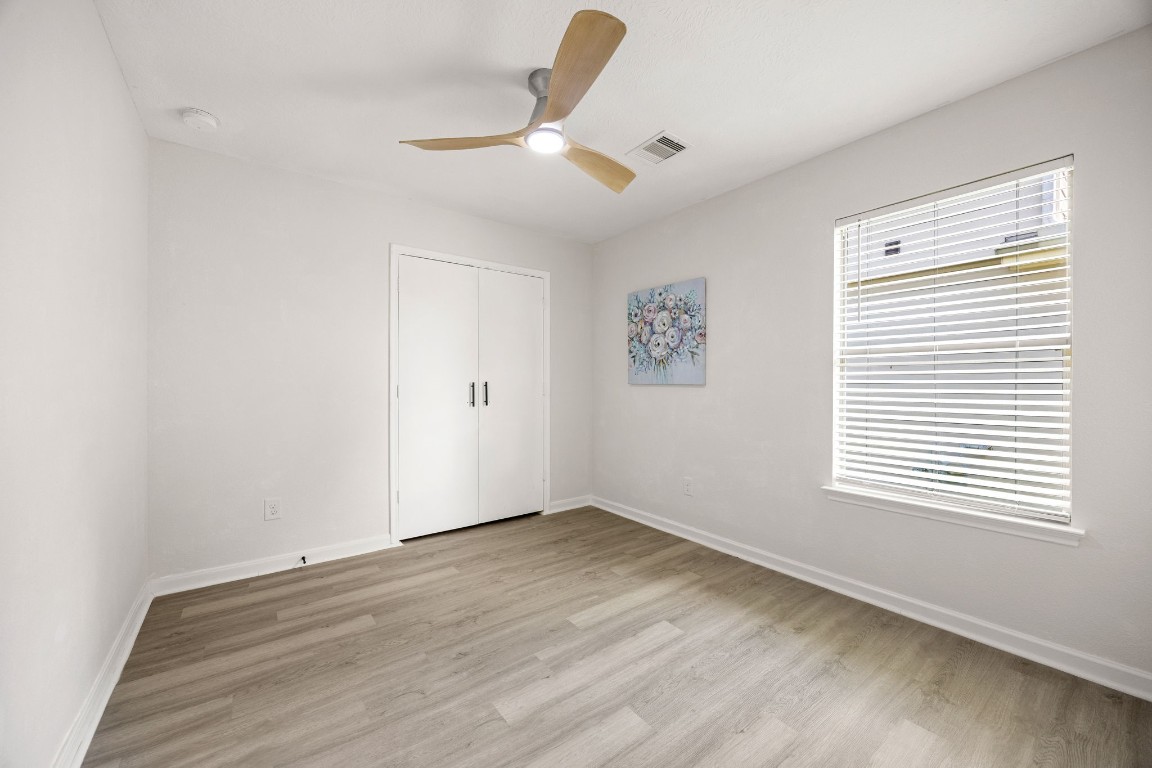 1010 Hummingbird Point Lane Houston, TX 77090 - Photo 16 of 26 Secondary bedroom with versatile use for guests, kids, or a home office.