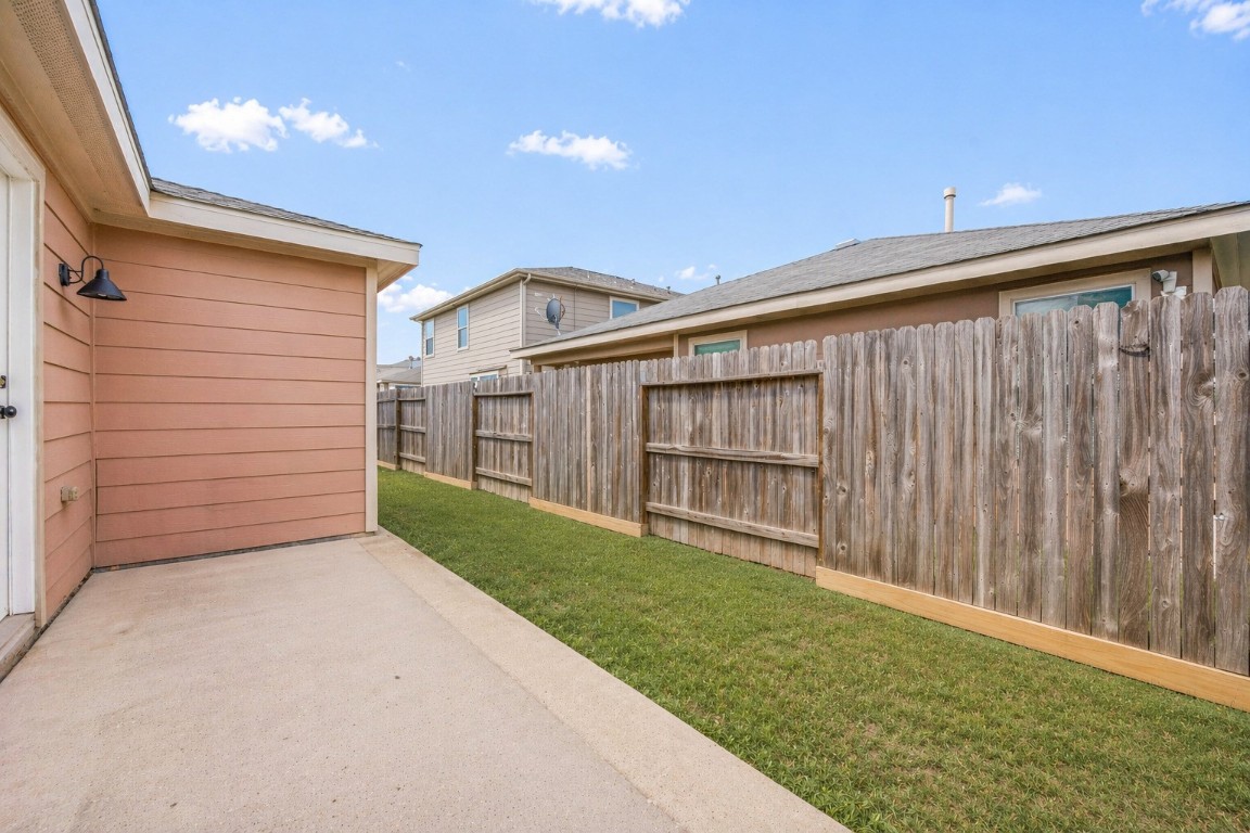 1010 Hummingbird Point Lane Houston, TX 77090 - Photo 22 of 26 Private, low-maintenance backyard offering just the right amount of space to enjoy outdoor activities without the upkeep.