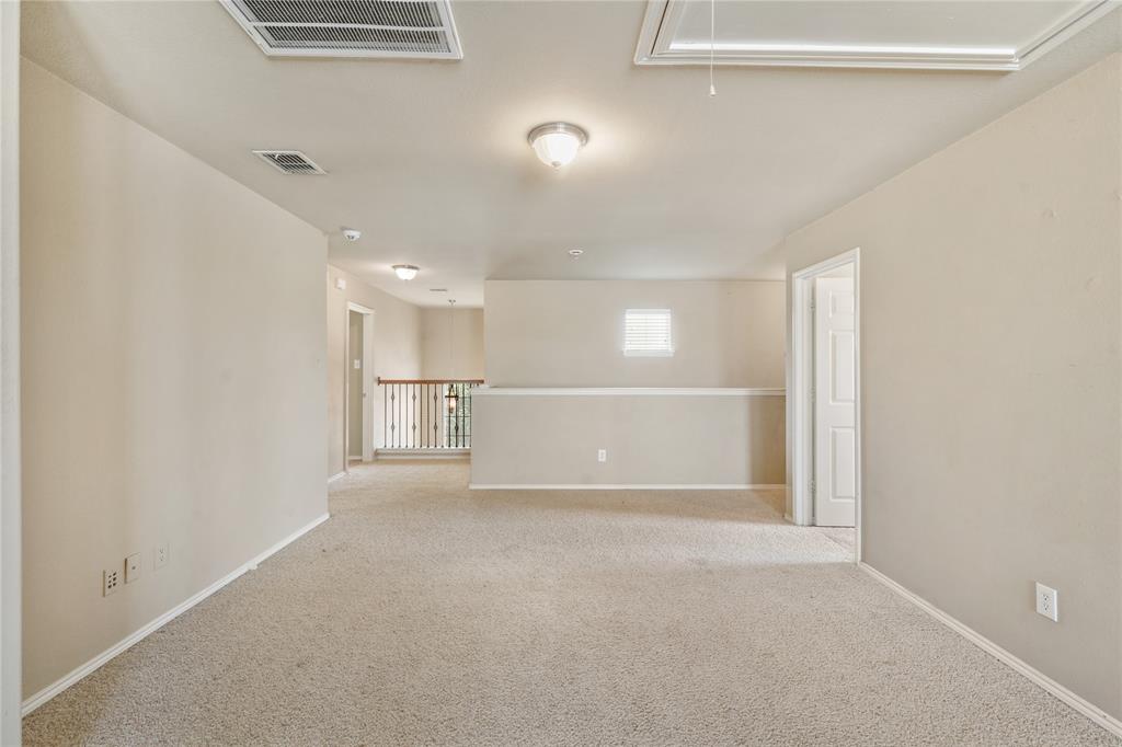 2003 Diamondback Forney, TX 75126 - Photo 18 of 30 Unfurnished room featuring light colored carpet