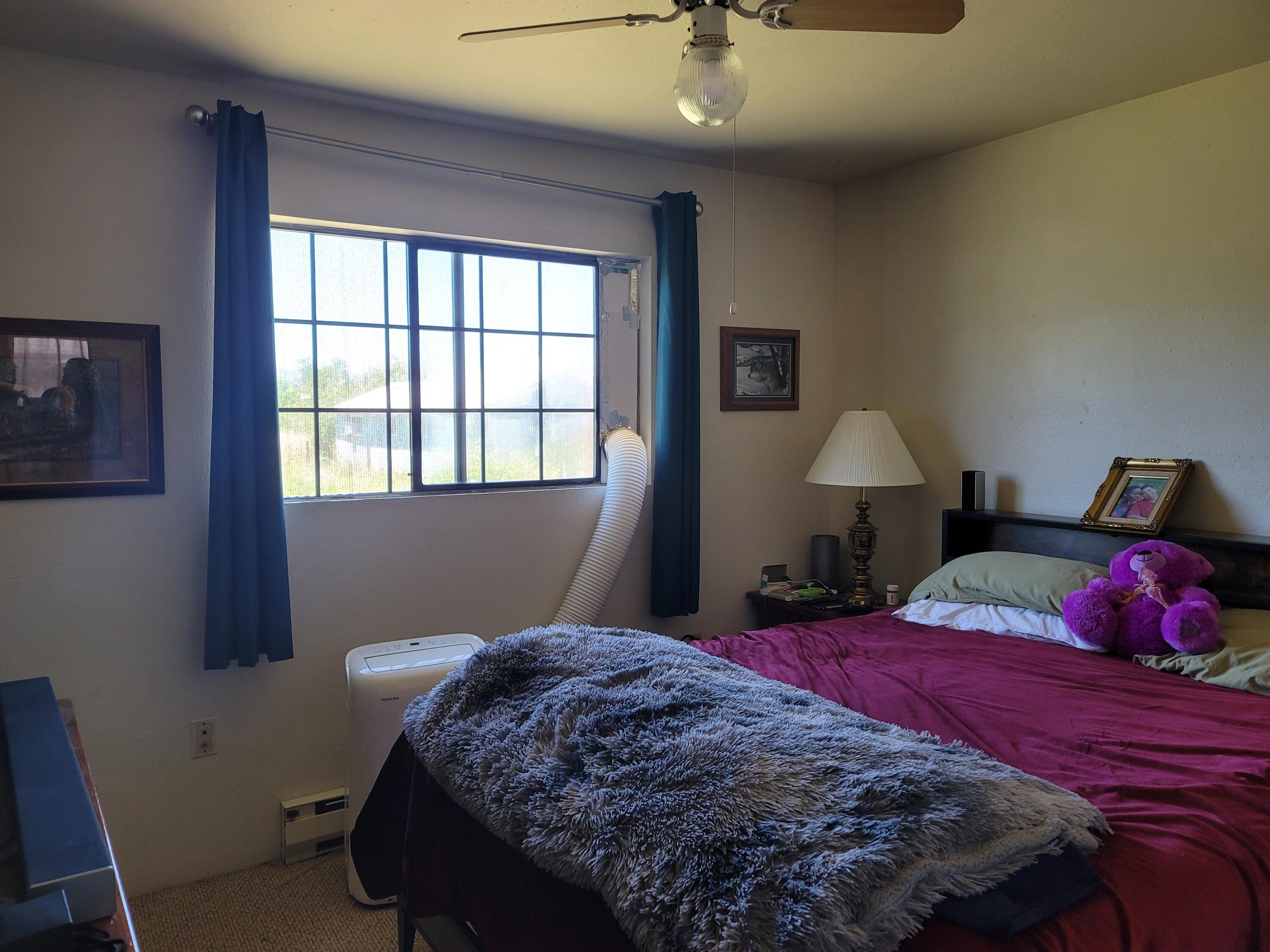 1678 Dowell Road Grants Pass, OR 97527 - Photo 13 of 22 Master Bedroom