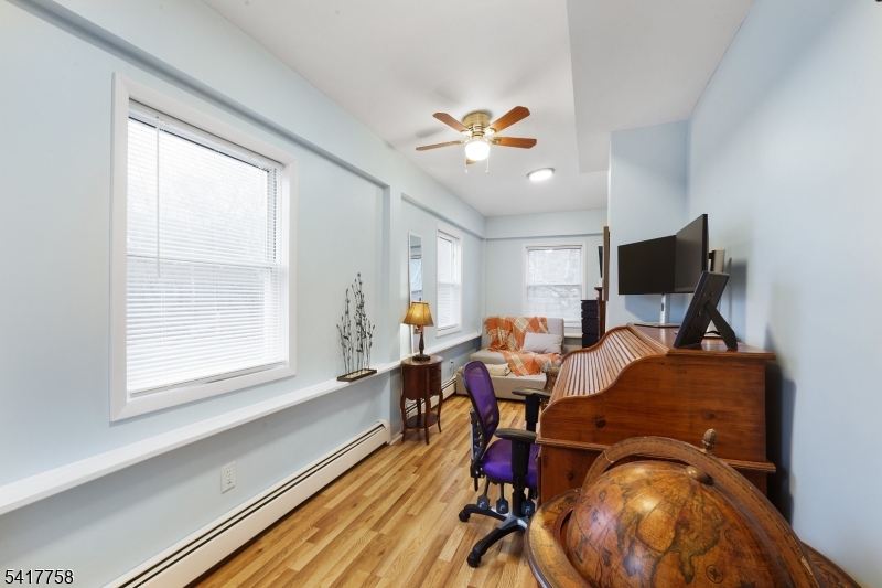 322 Berkshire Valley Road Wharton, NJ 07885 - Photo 12 of 30 a view of a workspace with furniture and a window