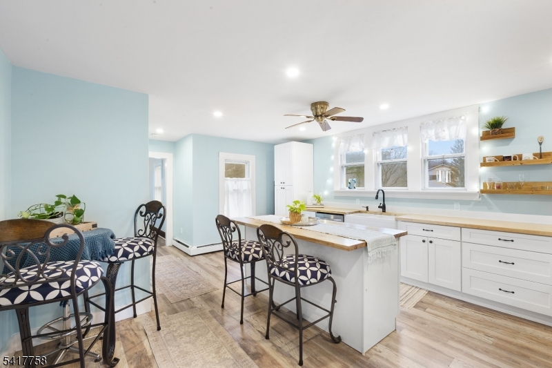 322 Berkshire Valley Road Wharton, NJ 07885 - Photo 5 of 30 a view of dining table chairs and window