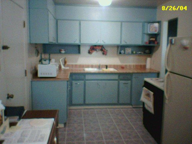 5103 South Bonham Street Amarillo, TX 79110 - Photo 2 of 3 a kitchen with a sink stove and cabinets