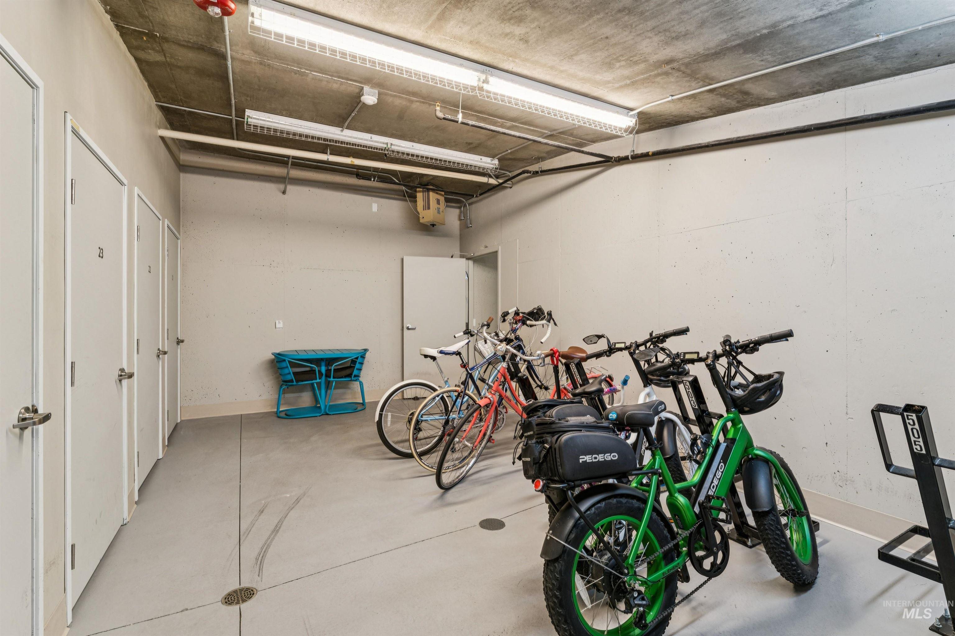 119 South 10th Street, Unit 307 Boise, ID 83702 - Photo 41 of 47 Secure storage facility with individual storage units, concrete flooring, and exposed concrete ceiling
