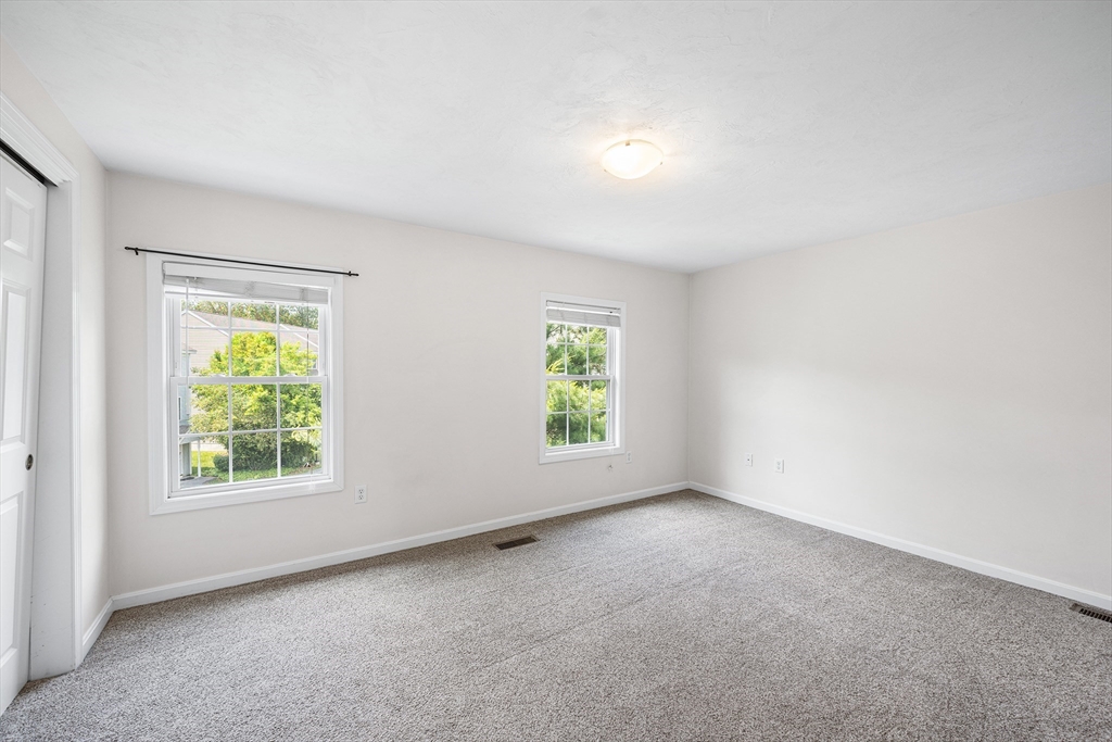 41 Boston Road, Unit 234 Billerica, MA 01862 - Photo 11 of 18 an empty room with windows