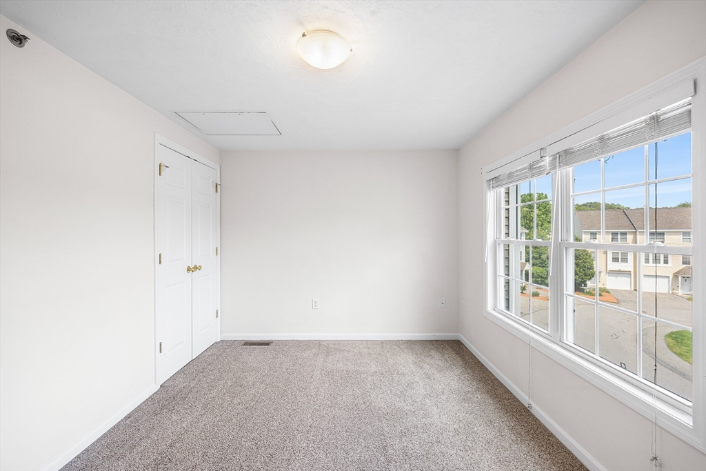 41 Boston Road, Unit 234 Billerica, MA 01862 - Photo 7 of 18 a view of an empty room with a window