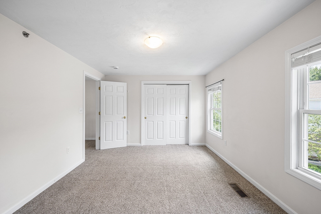 41 Boston Road, Unit 234 Billerica, MA 01862 - Photo 10 of 18 a view of an empty room with a window