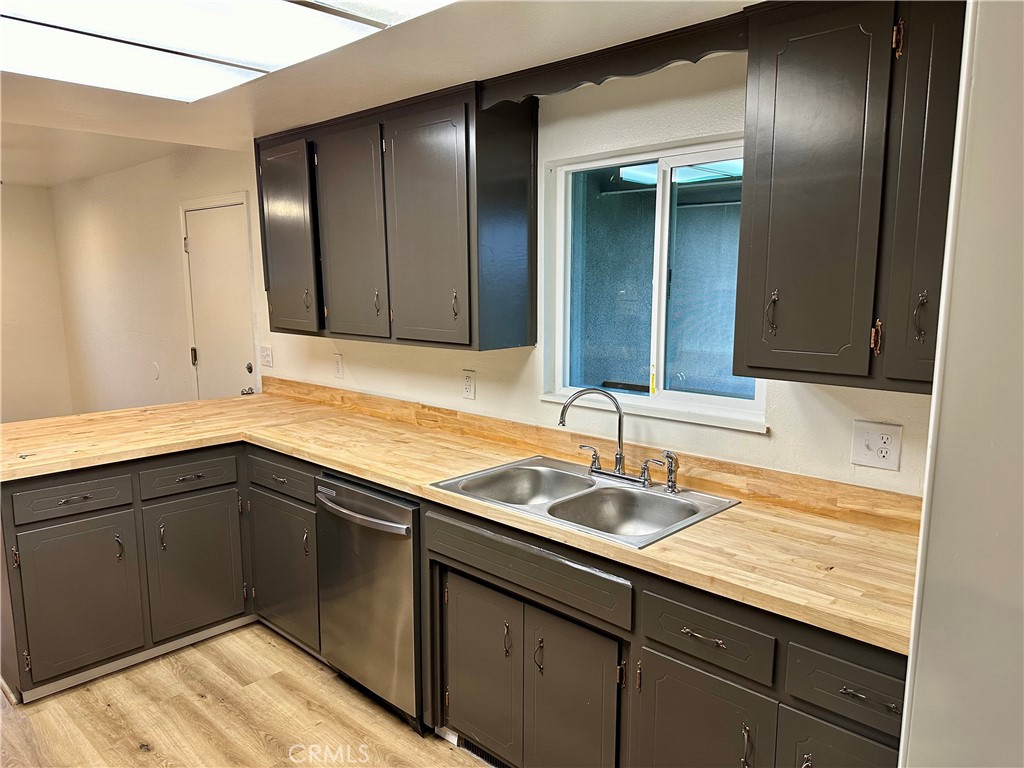 1231 7th Street Livingston, CA 95334 - Photo 19 of 39 a bathroom with a sink and a mirror