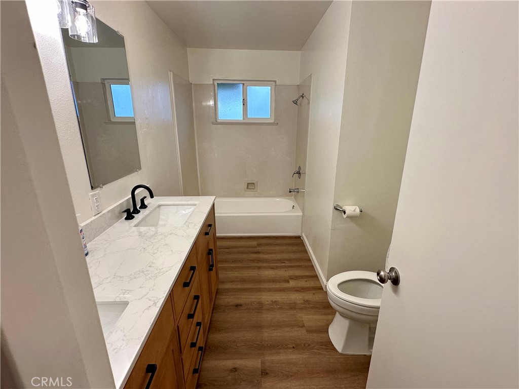 1231 7th Street Livingston, CA 95334 - Photo 22 of 39 a bathroom with a sink and a mirror