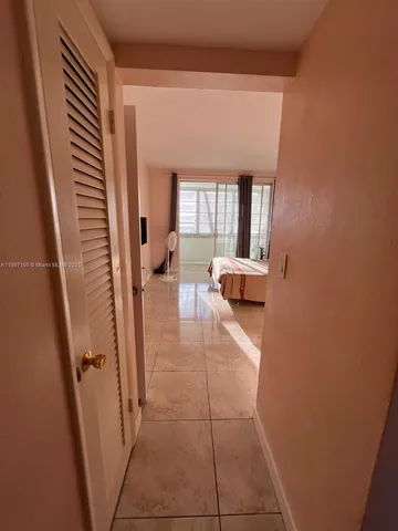 a bathroom with a sink vanity and mirror