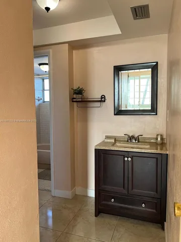 a room with furniture and a window