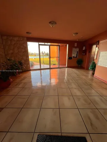 a view of a lake with a yard