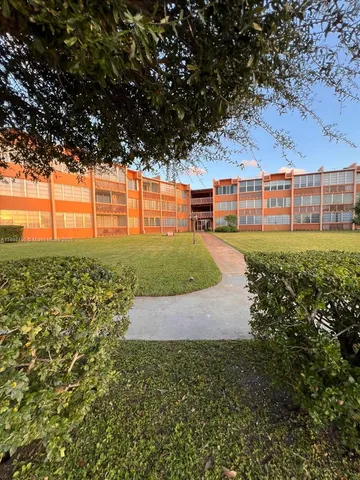 a view of a lake with a yard