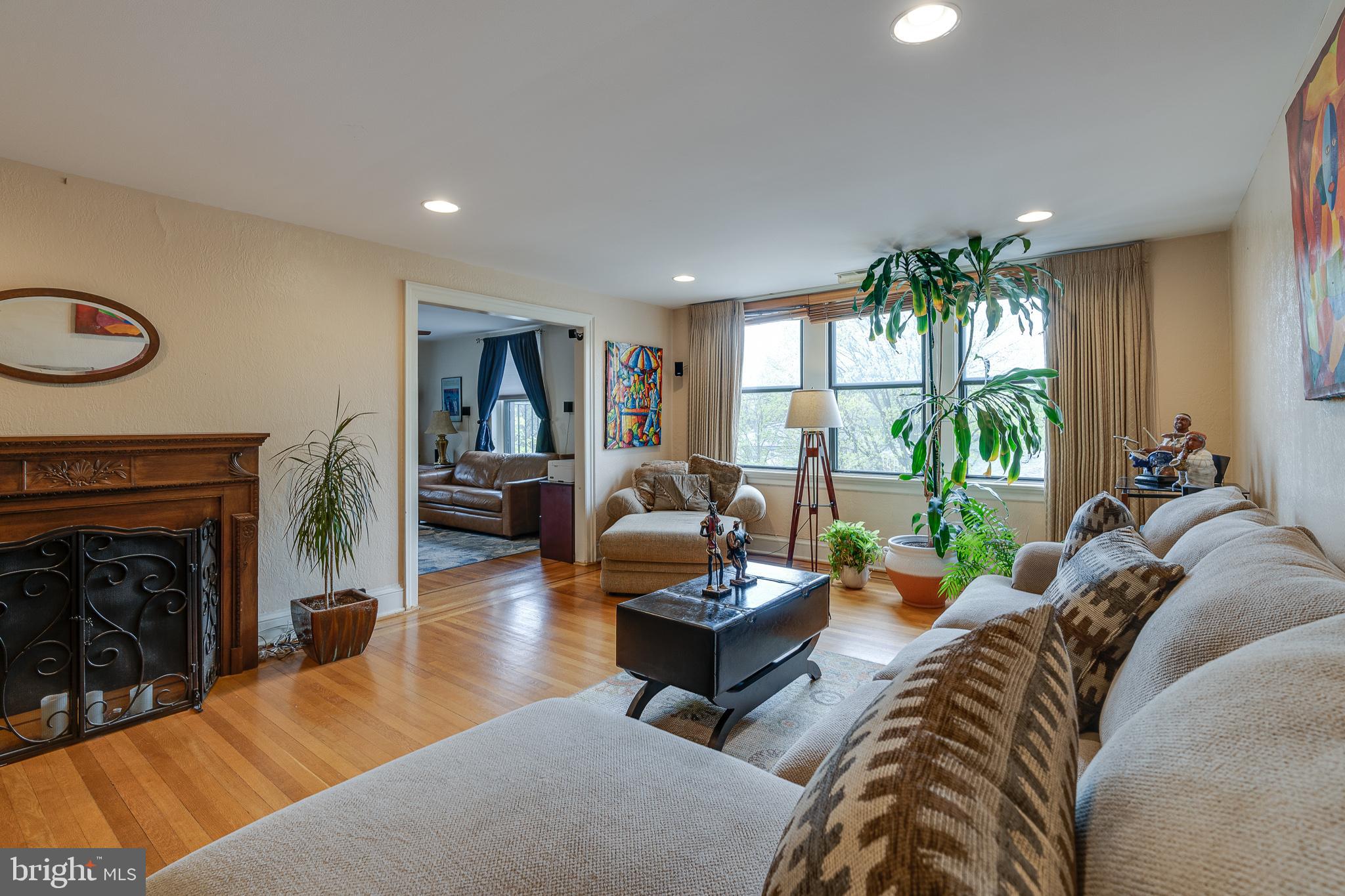 900 Valley Road, Unit B401 Elkins Park, PA 19027 - Photo 16 of 30 Living Room with Fireplace