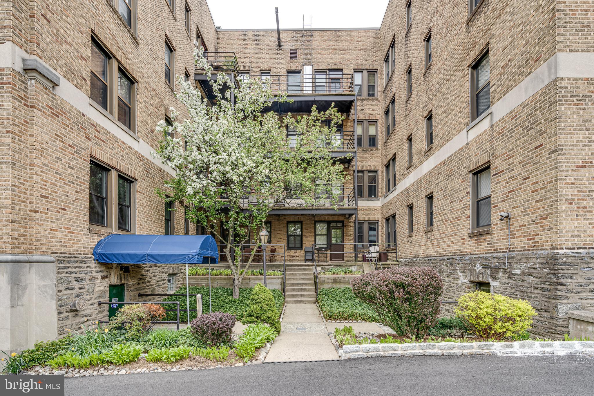 900 Valley Road, Unit B401 Elkins Park, PA 19027 - Photo 29 of 30 Rear Courtyard Entrance