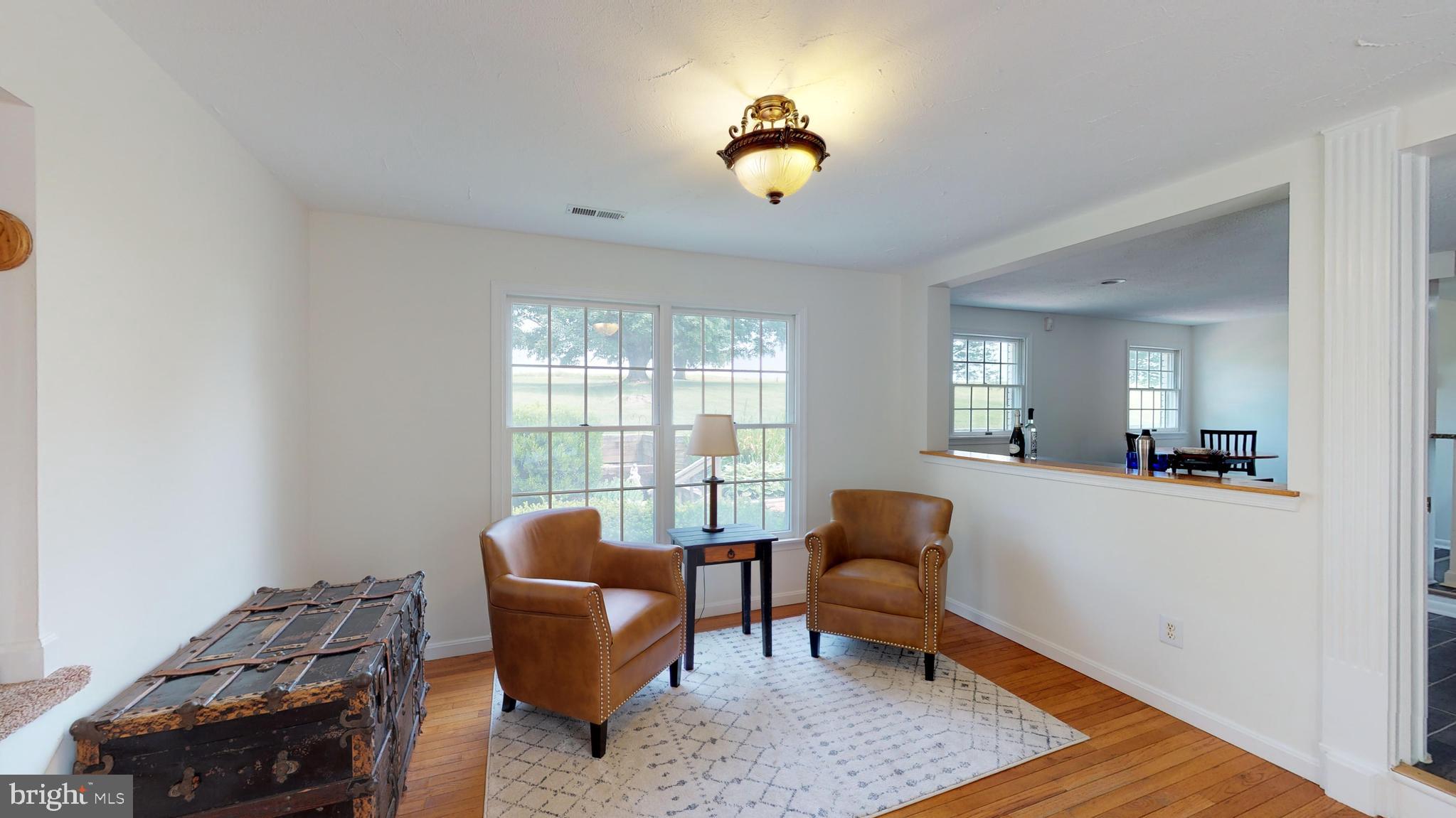 13446 Bottom Road Hydes, MD 21082 - Photo 40 of 79 Morning Room with Peak Thru to Kitchen