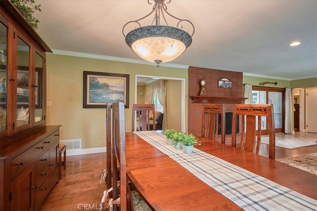 2221 Elsinore Road Riverside, CA 92506 - Photo 15 of 65 a view of a living room and dining room