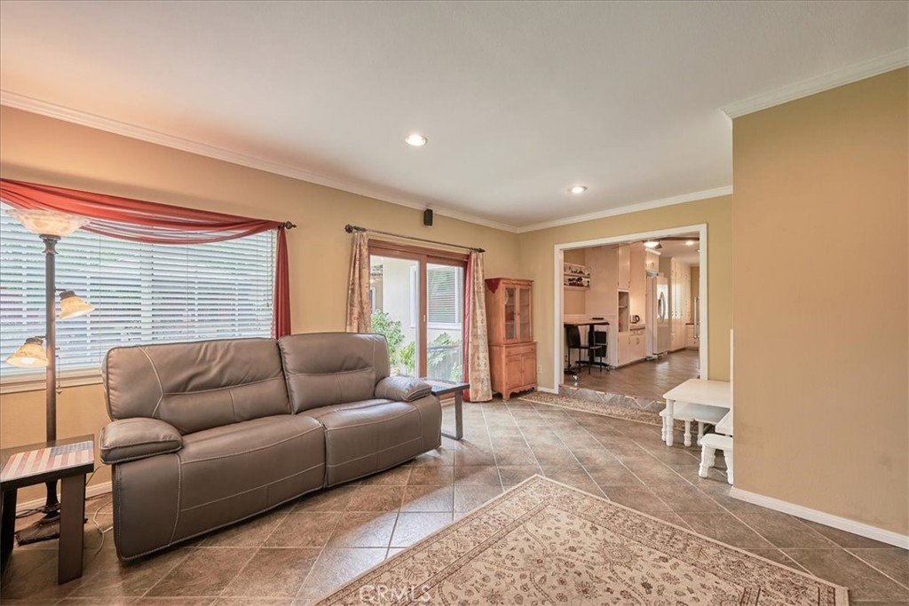 2221 Elsinore Road Riverside, CA 92506 - Photo 25 of 65 a living room with furniture and a window