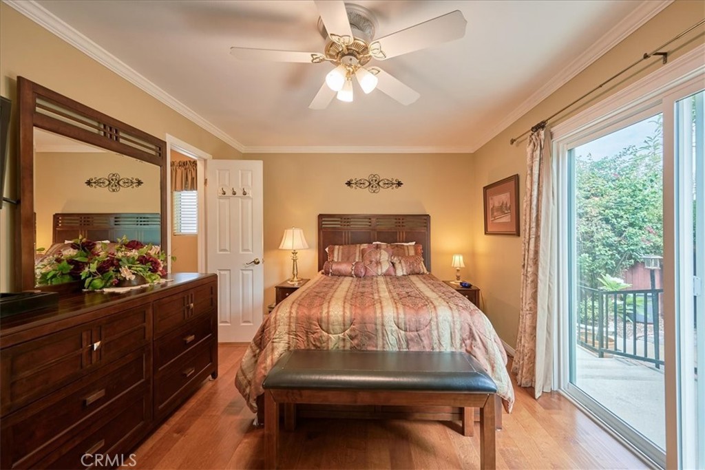 2221 Elsinore Road Riverside, CA 92506 - Photo 26 of 65 a bed room with a bed and a dresser