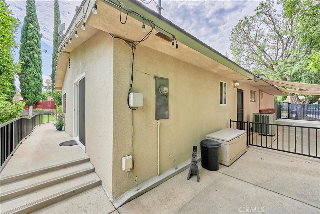 2221 Elsinore Road Riverside, CA 92506 - Photo 60 of 65 a view of a porch with wooden floor and fence