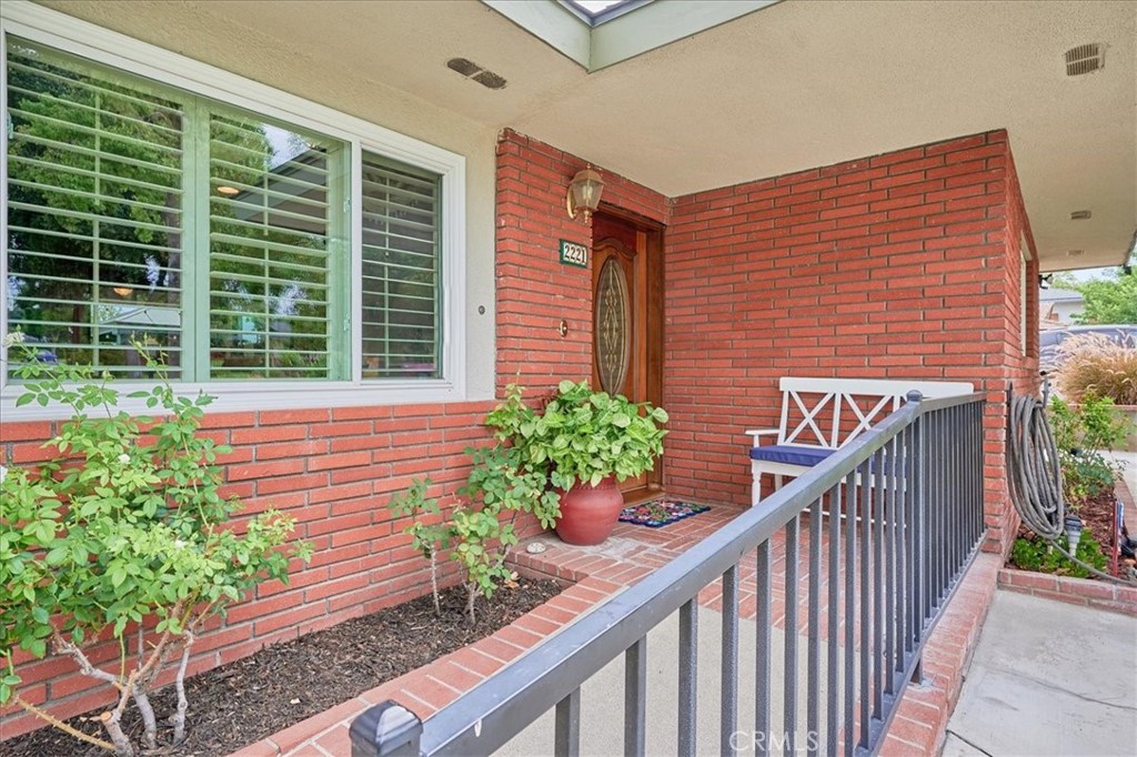 2221 Elsinore Road Riverside, CA 92506 - Photo 7 of 65 a view of a balcony with flower plants