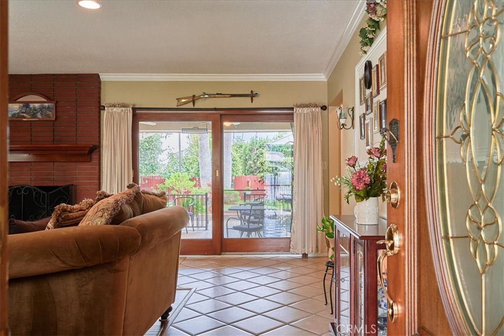 2221 Elsinore Road Riverside, CA 92506 - Photo 8 of 65 a living room with furniture and a large window