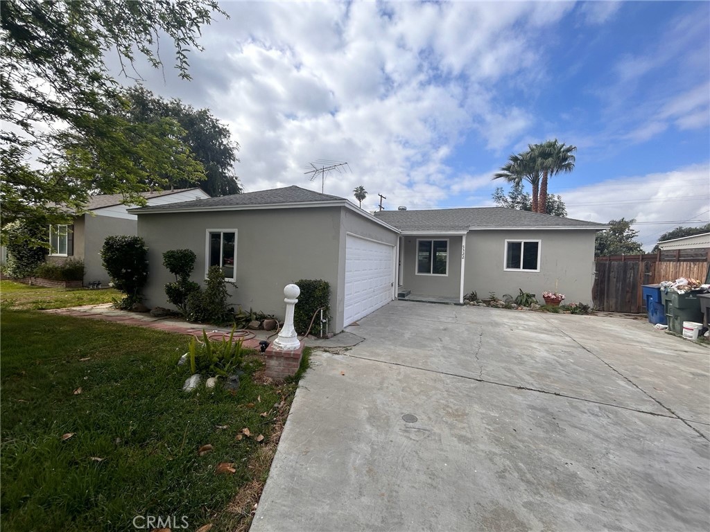 5322 Sierra Street Riverside, CA 92504 - Photo 1 of 1 a front view of house with yard and green space