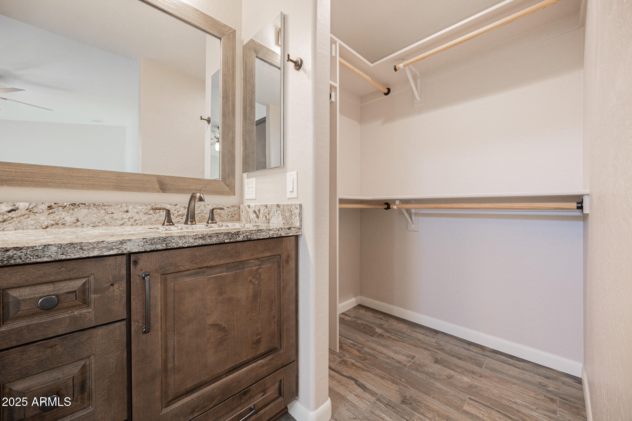 1633 East Beautiful Lane Phoenix, AZ 85042 - Photo 17 of 27 a bathroom with a granite countertop sink toilet and shower