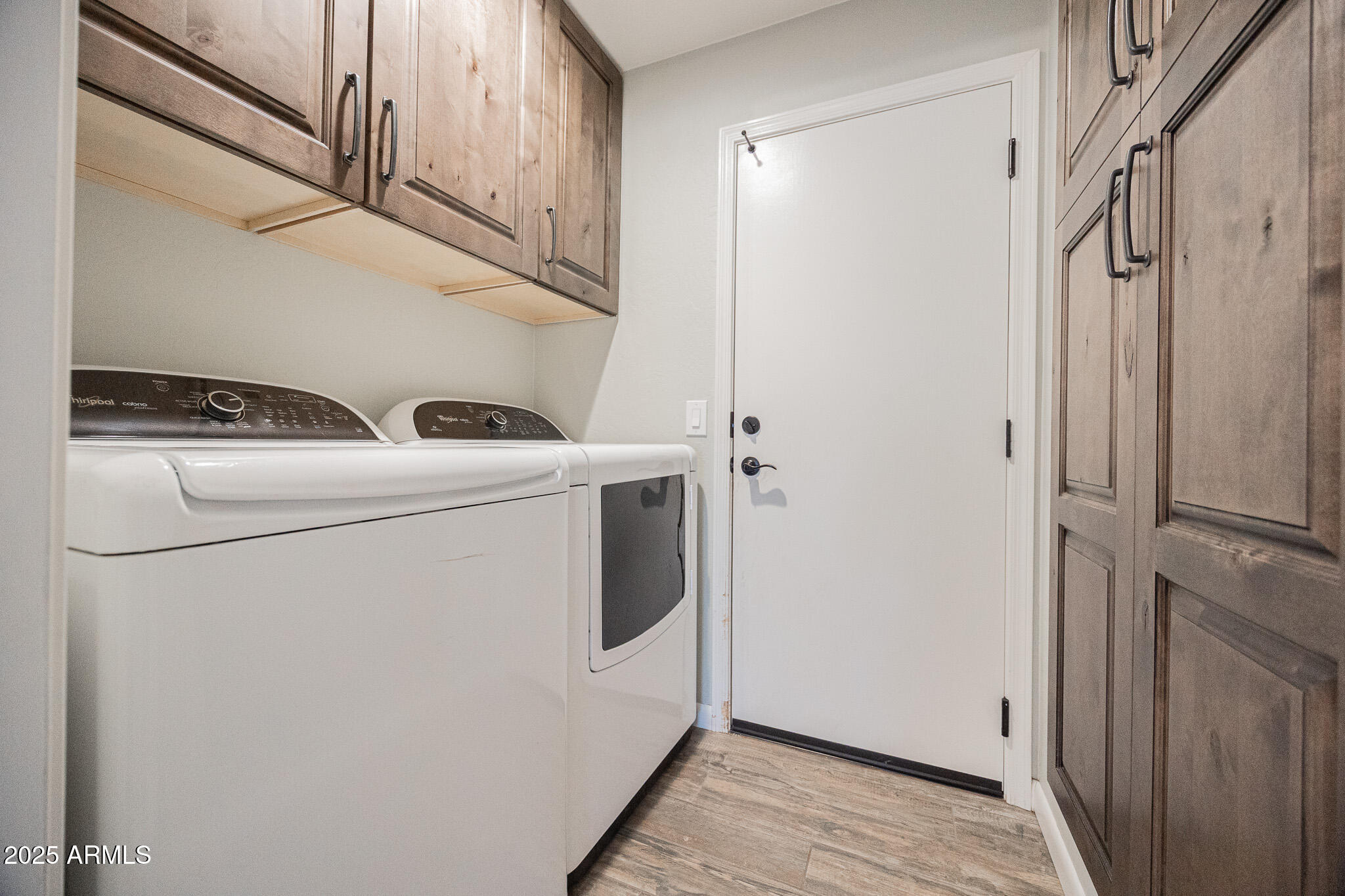 1633 East Beautiful Lane Phoenix, AZ 85042 - Photo 23 of 27 a utility room with dryer and washer