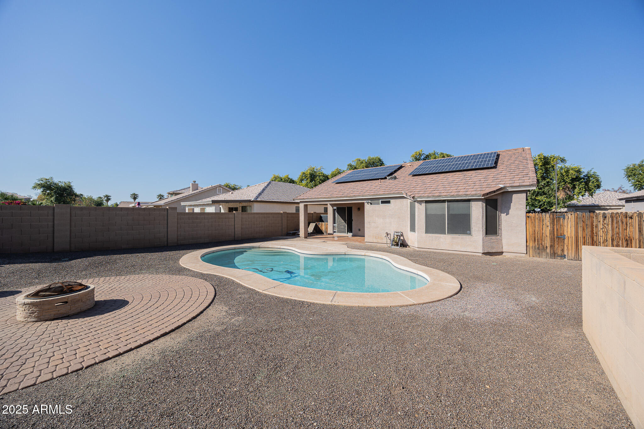 1633 East Beautiful Lane Phoenix, AZ 85042 - Photo 24 of 27 a terrace with a table and chairs