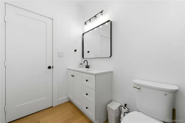 a view of a livingroom with walk in closet and bedroom