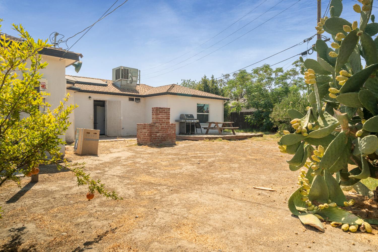 1900 Easy Street Hanford, CA 93230 - Photo 23 of 23 a view of a house with a yard