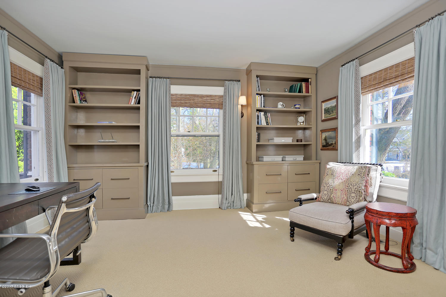 49 Calhoun Drive Greenwich, CT 06831 - Photo 11 of 21 a living room with furniture and a window