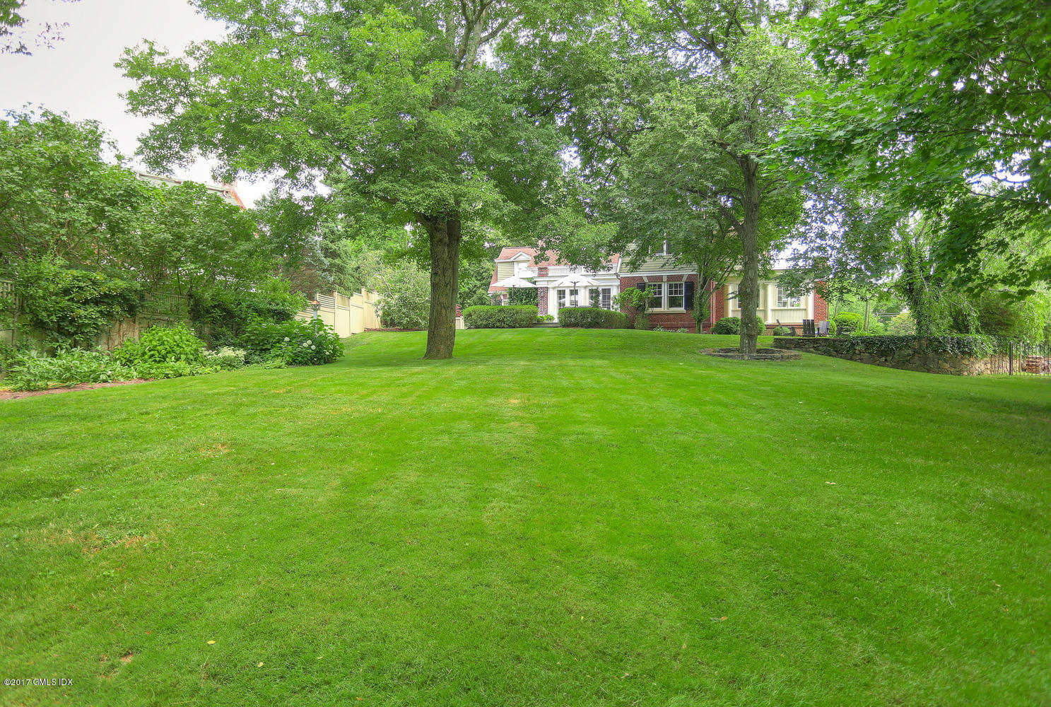 49 Calhoun Drive Greenwich, CT 06831 - Photo 20 of 21 a huge green field with lots of trees