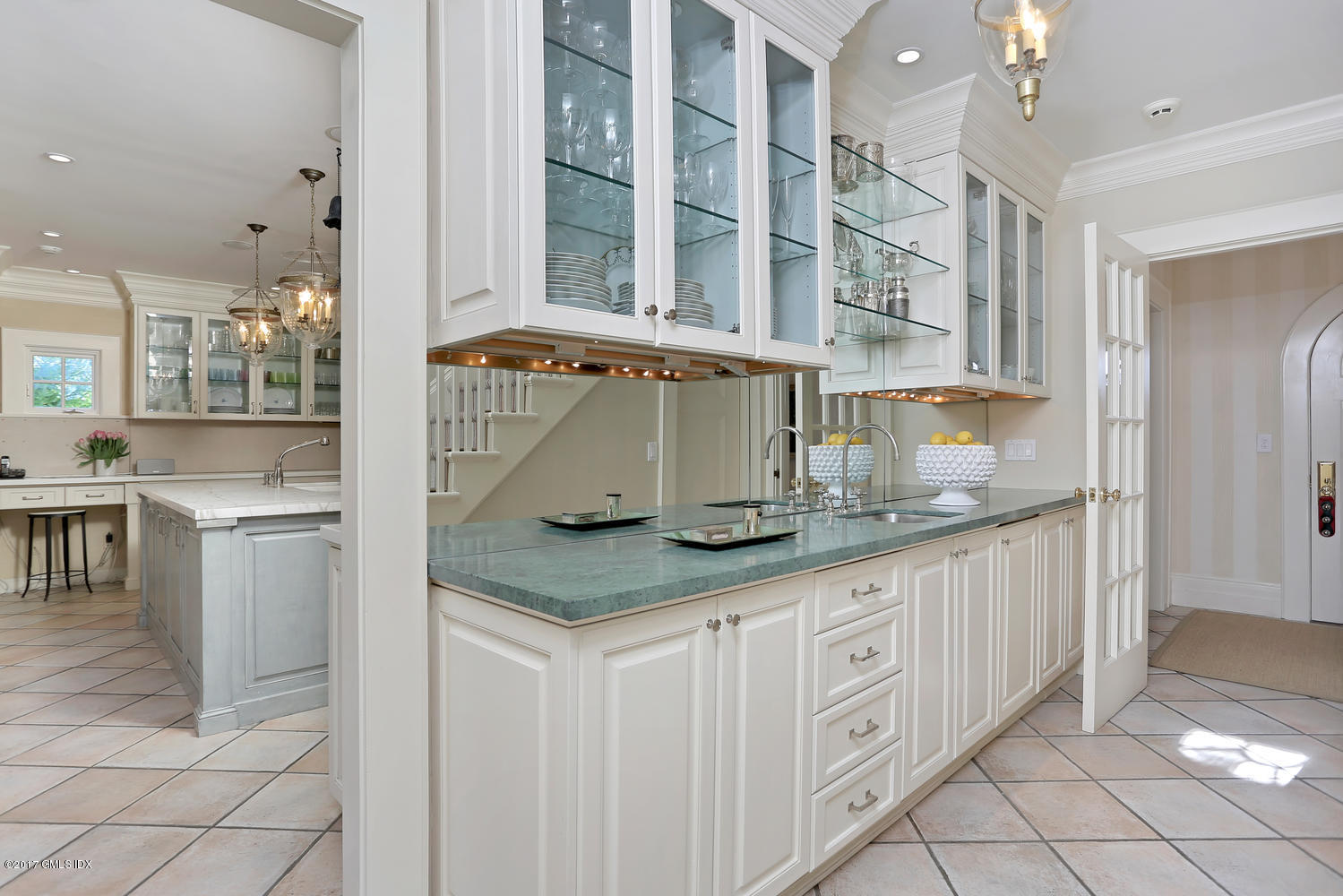 49 Calhoun Drive Greenwich, CT 06831 - Photo 5 of 21 a kitchen with stainless steel appliances granite countertop a sink and cabinets