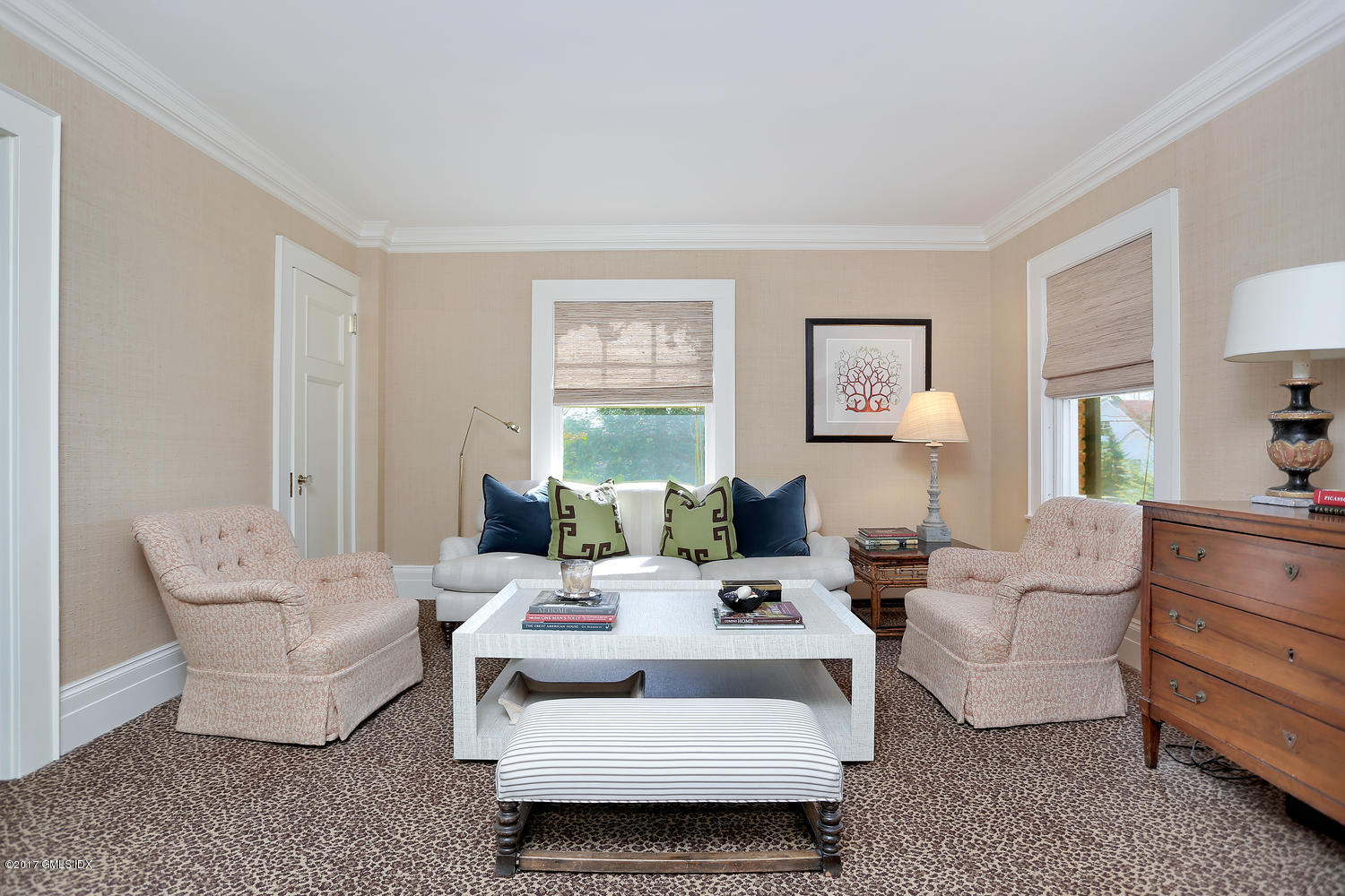 49 Calhoun Drive Greenwich, CT 06831 - Photo 8 of 21 a living room with furniture and painting on the wall