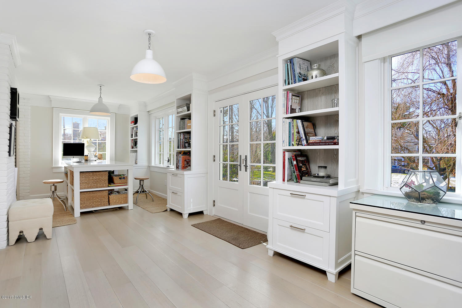 49 Calhoun Drive Greenwich, CT 06831 - Photo 9 of 21 a living room with furniture and a book shelf