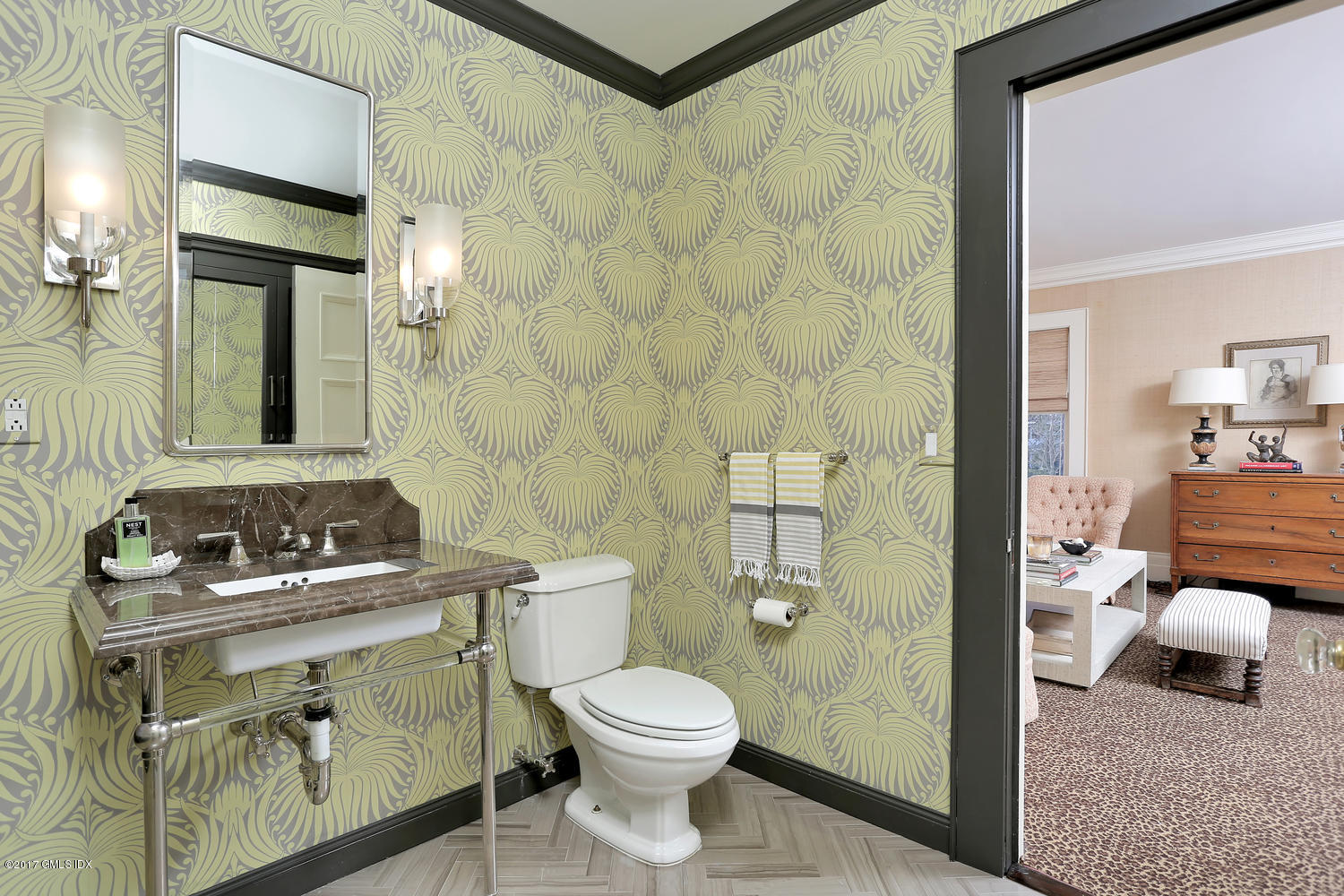 49 Calhoun Drive Greenwich, CT 06831 - Photo 10 of 21 a bathroom with a toilet a sink and shower